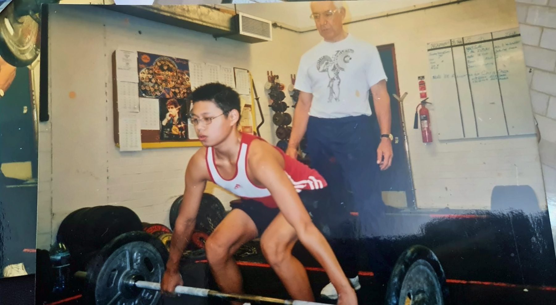 Brian watching a young lifter set up for a pull