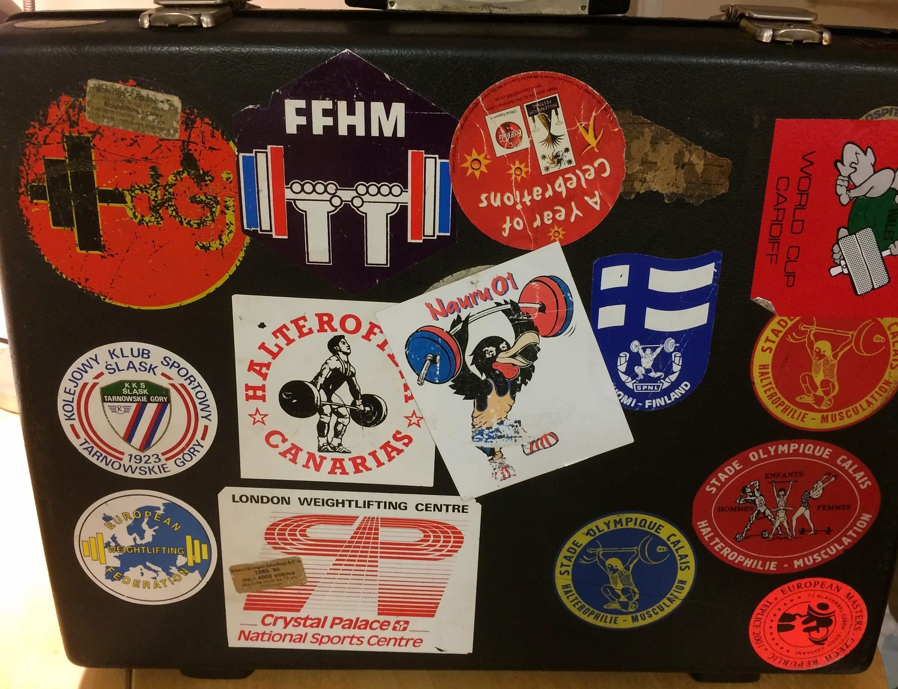 His case covered in stickers from competitions across Europe
